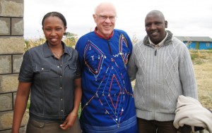 Emily Sorimpan, TWF Chairman Ed Loosli and David Sorimpan at their home in Olerai Conservancy